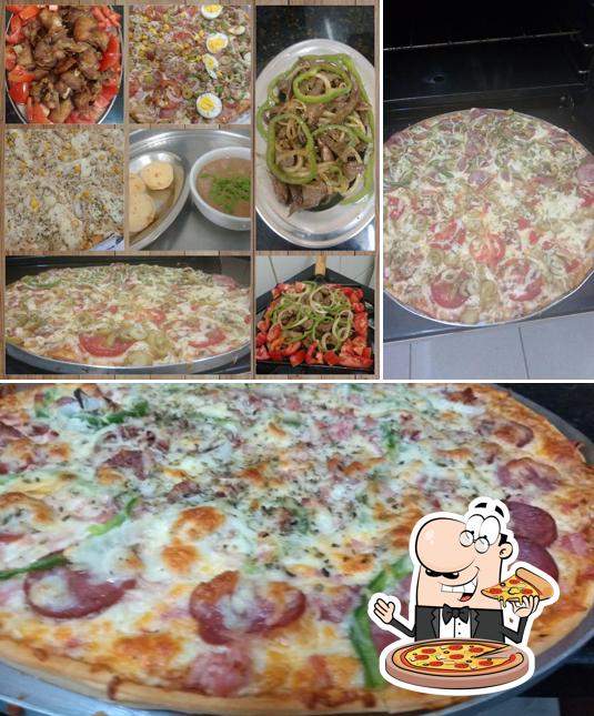 Experimente pizza no Bar Pizzaria Ponto Do Sabor