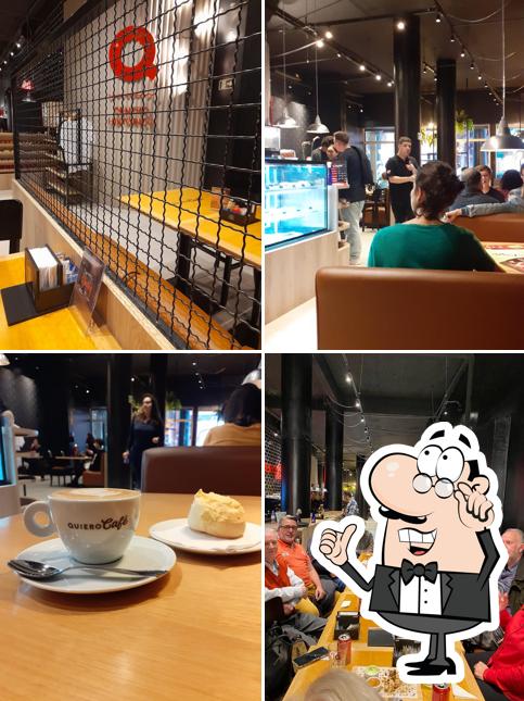 Sente em uma das mesas no Quiero Café