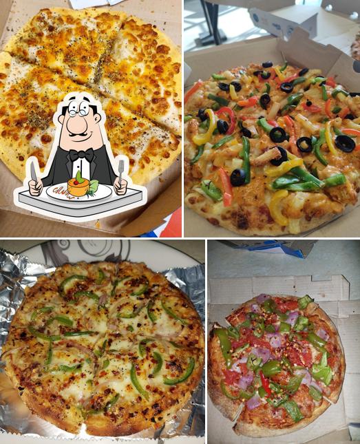 Cheese pizza at Domino's Pizza Orange Corner, Ahmednagar