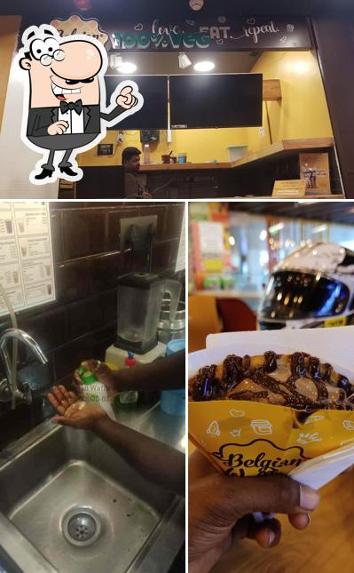 Take a look at the picture showing interior and food at The Belgian Waffle Co