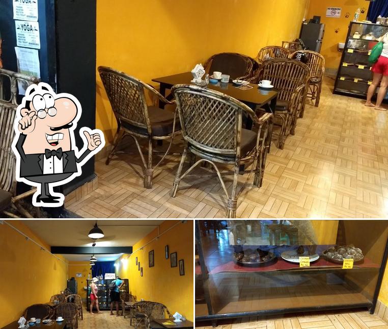 This is the photo showing interior and food at Palolem Corner