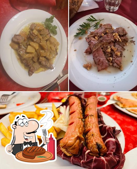 Prenditi i un pasto a base di carne a Ristorante Pizzeria Madamadorè - Il Bocconcino Snc