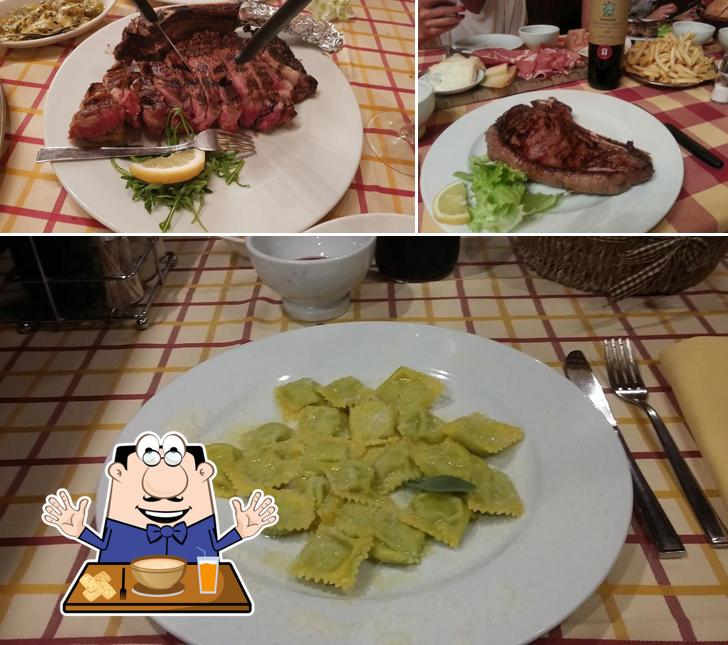 La foto di cibo e tavolo da pranzo da Taverna Dei Sapori