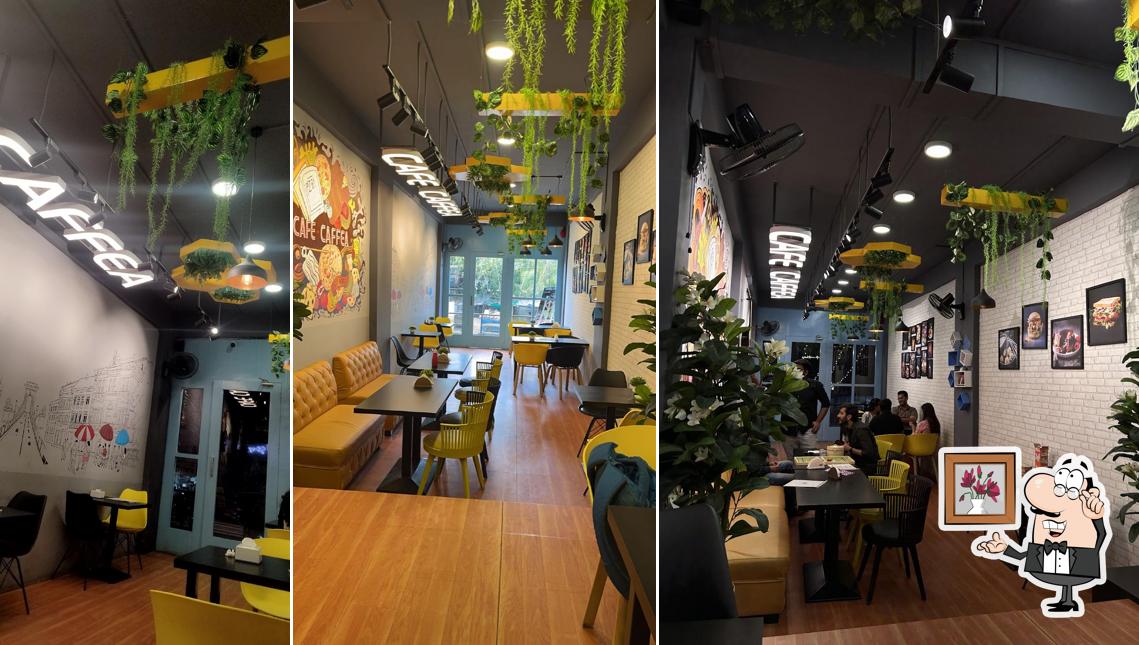 Take a seat at one of the tables at Cafe Caffea