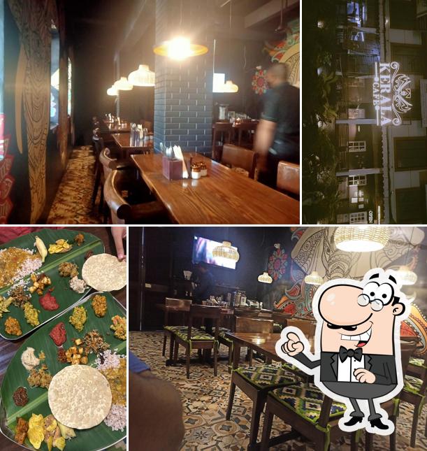 Take a seat at one of the tables at Kerala Cafe Take a seat at one of the tables at Kerala Cafe