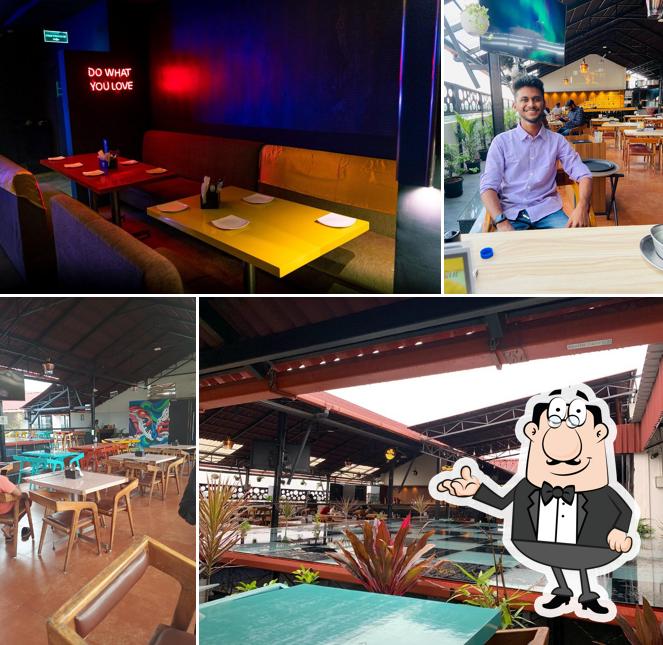 Take a seat at one of the tables at Club Illusion