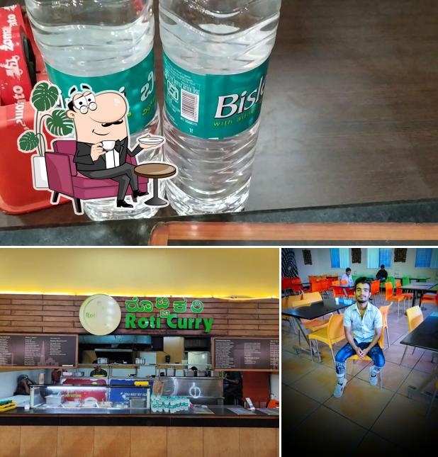 Among various things one can find interior and beverage at Roti Curry