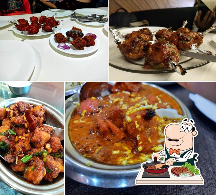 Order meat dishes at আdda Inn