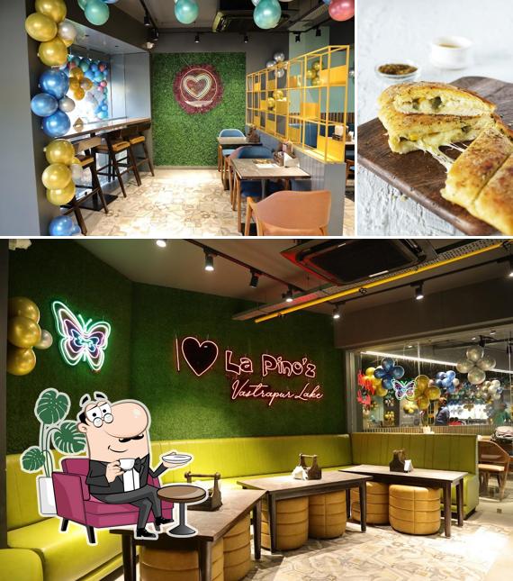 The photo of La Pino'z Pizza - Vastrapur Lake, Ahmedabad’s interior and food
