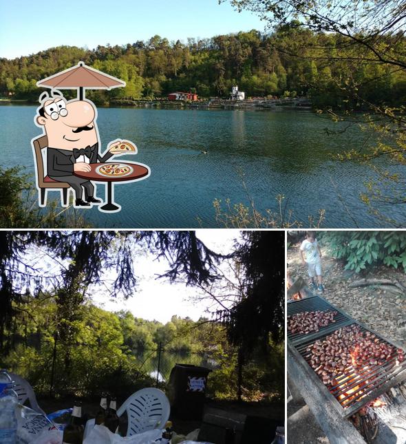 Puoi goderti l'aria fresca da seduto all'esterno di Alzaia club