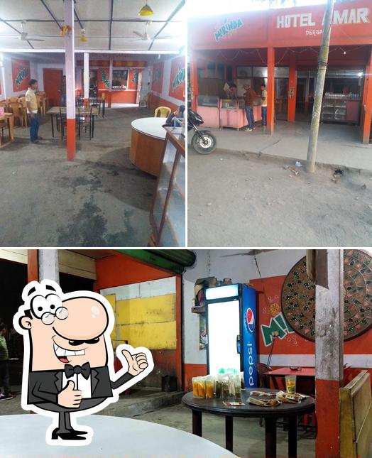 Look at the photo of Bhojanalay Dhaba