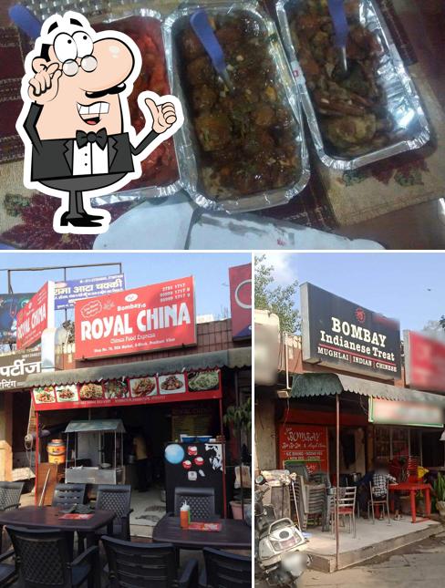 Check out the picture showing interior and food at Bombay Indianese Treat