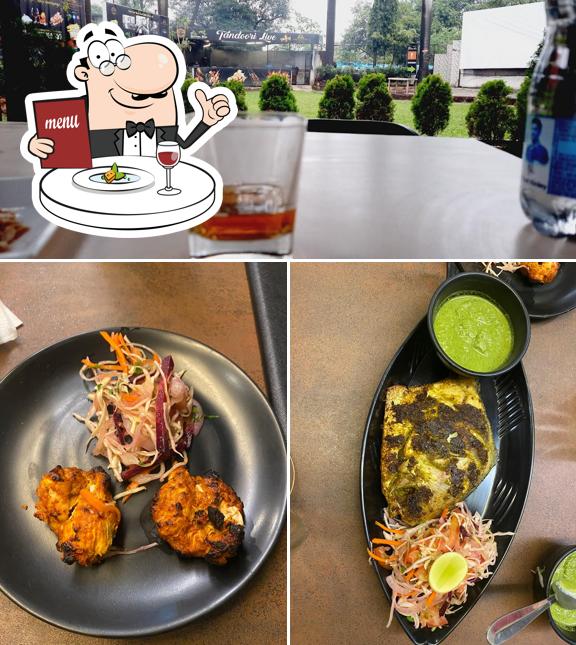 This is the picture displaying food and beer at The Garden Bar & Restaurant