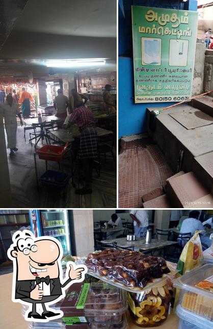 Look at this photo of Amutham Restaurant