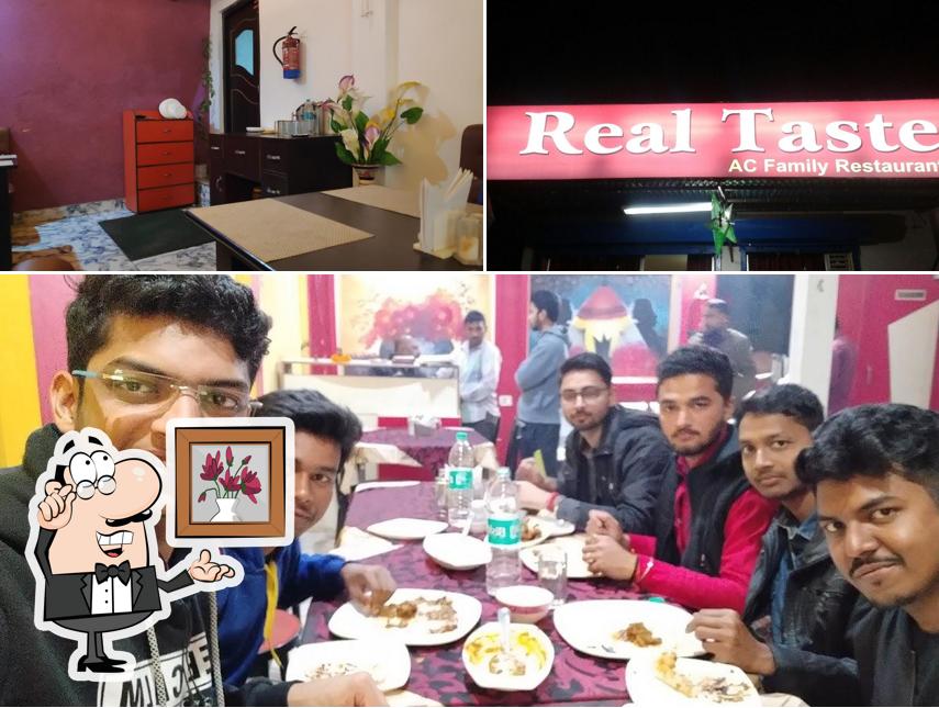 Take a seat at one of the tables at Real Taste