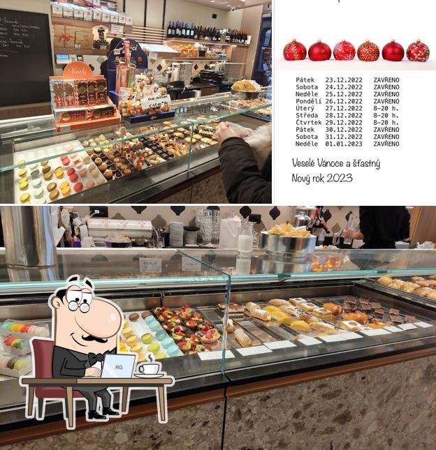 Questa è la foto che mostra la interni e cibo di Bar Ferrari