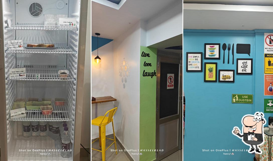 Take a seat at one of the tables at Dough Dekor Cafe । ড' ডেক'ৰ কেফে (Hub of Luscious International Pâtisserie)