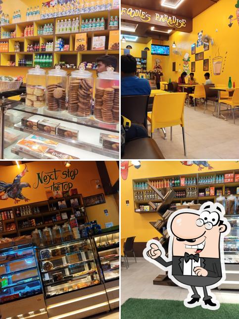 Check out how DJ Tea, Juice & Snacks Hub looks inside