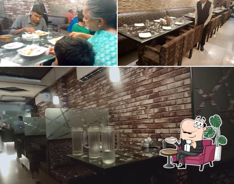 Take a seat at one of the tables at Shyam's Bombay Halwa House