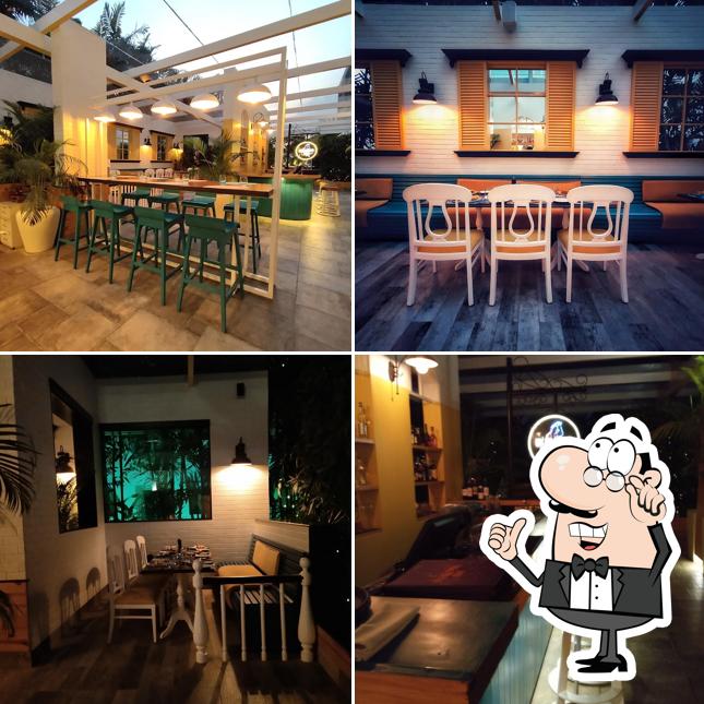 Take a seat at one of the tables at Europa 360 by Radisson Blu Bengaluru Outer Ring Road