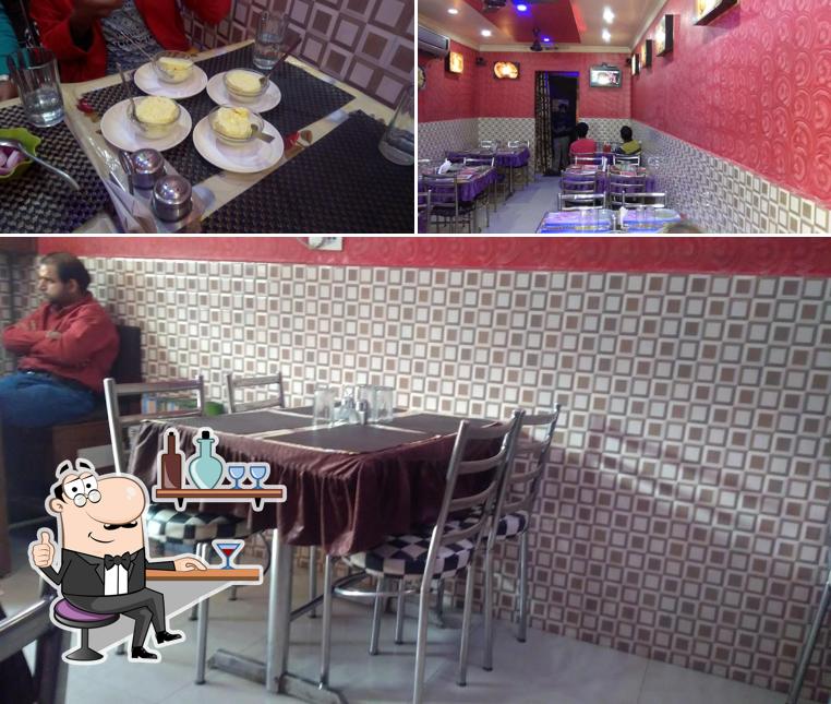 Take a seat at one of the tables at Fast Bite Restro