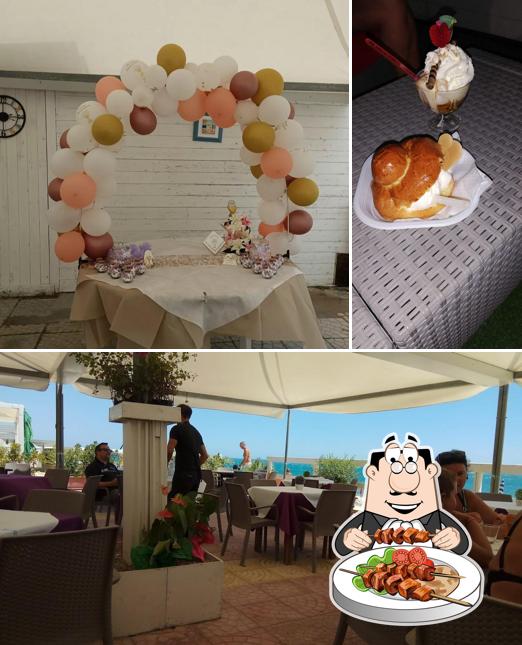 Dai un’occhiata alla foto che presenta la cibo e interni di Blu Cafe