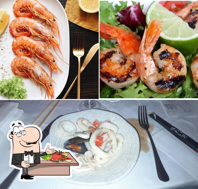 Ordina la cucina di mare a Yugo Arcore