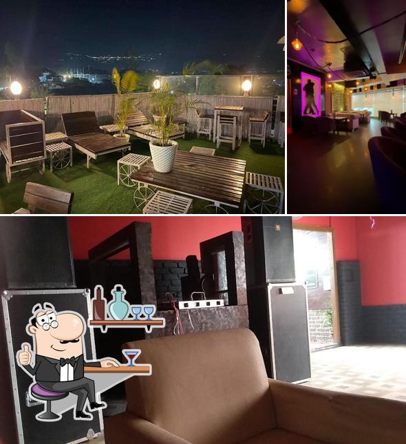 Take a seat at one of the tables at Venom Club and Kitchen