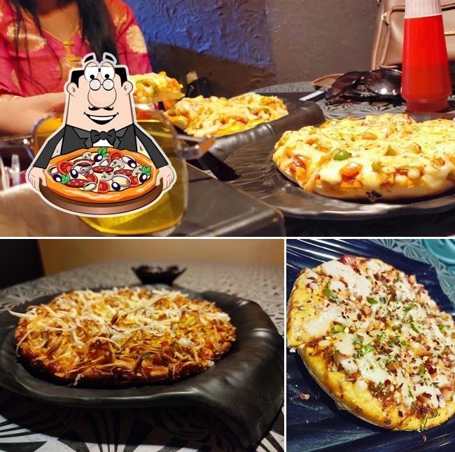 Pick pizza at FUSION CAFÉ