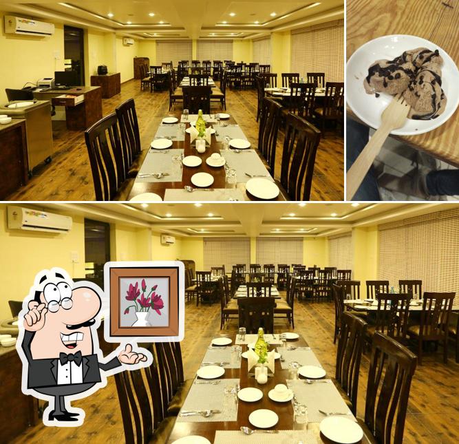 This is the image displaying interior and dessert at Black Night Pub & Discotheque by Padmini Bagh Resorts