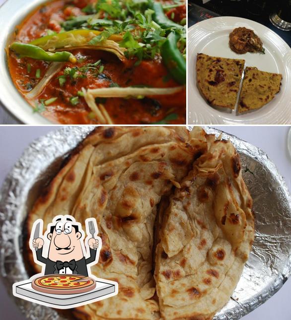 Try out pizza at Saffron The Restaurant - Amritpuram