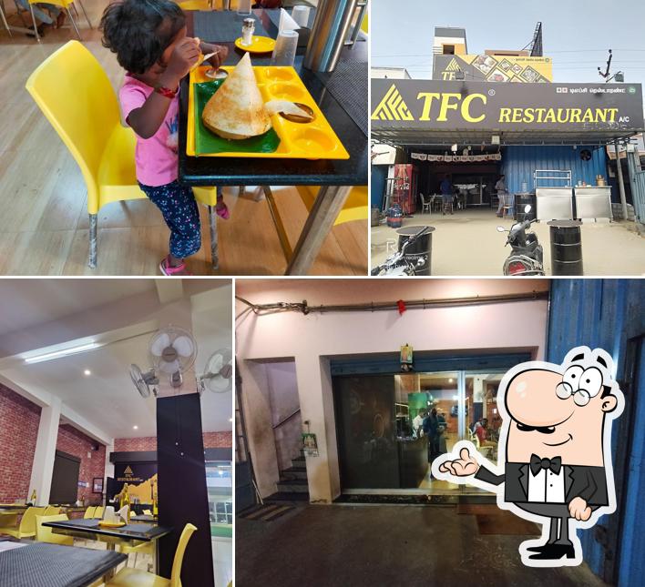 Take a seat at one of the tables at TFC Restaurant