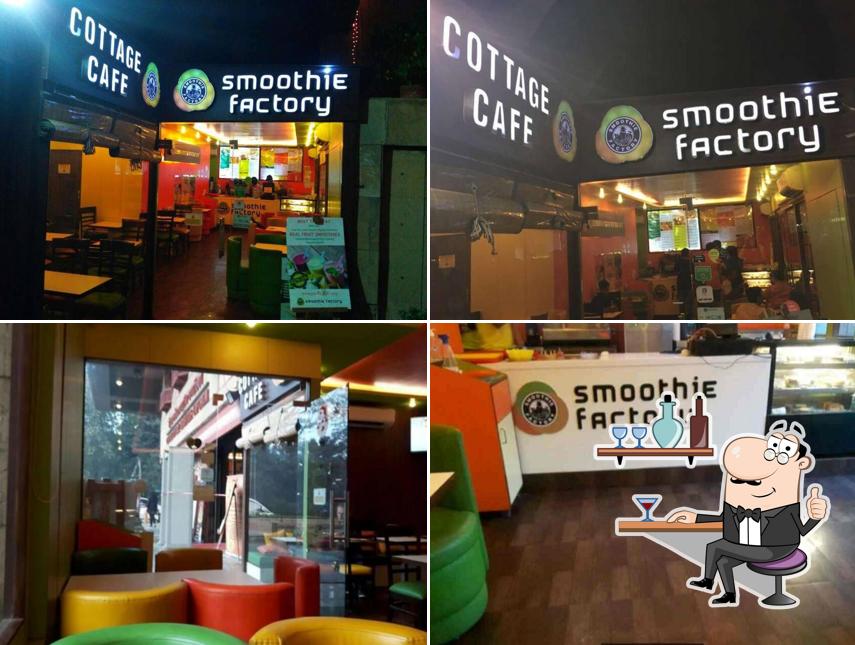 Take a seat at one of the tables at Cottage Café By Smoothie Valley