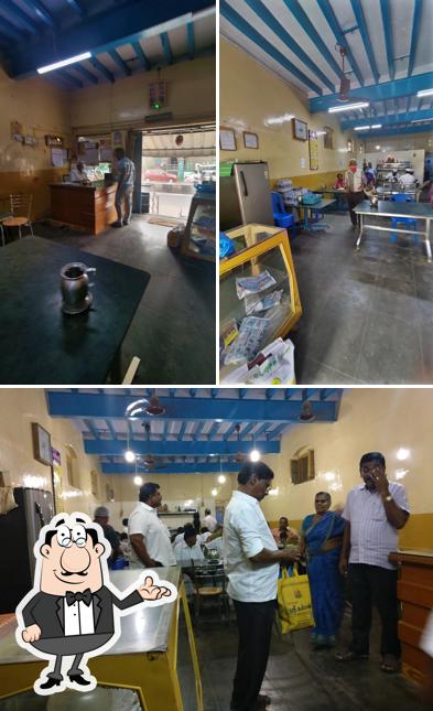 Take a seat at one of the tables at Ashok Bhavan