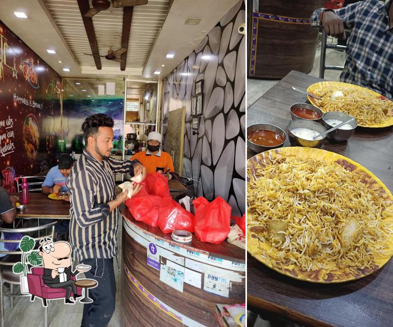 Take a seat at one of the tables at Kolkata Biryani House