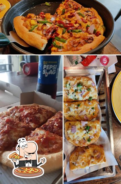Pick pizza at Pizza Hut Science City, Ahmedabad