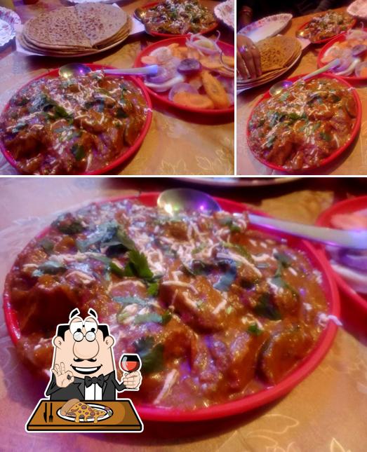 Try out pizza at Muri Rasoi