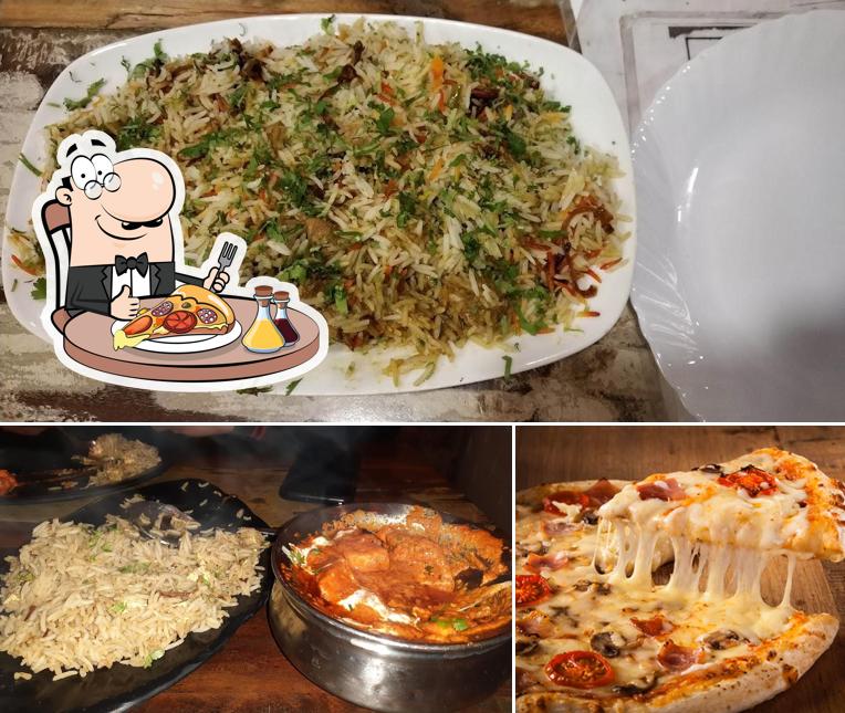 Get pizza at Noor Barcelo's Grill
