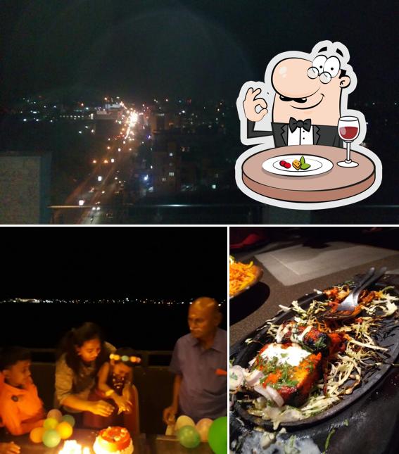 The photo of Sky Dine Roof Top Restaurant’s food and exterior
