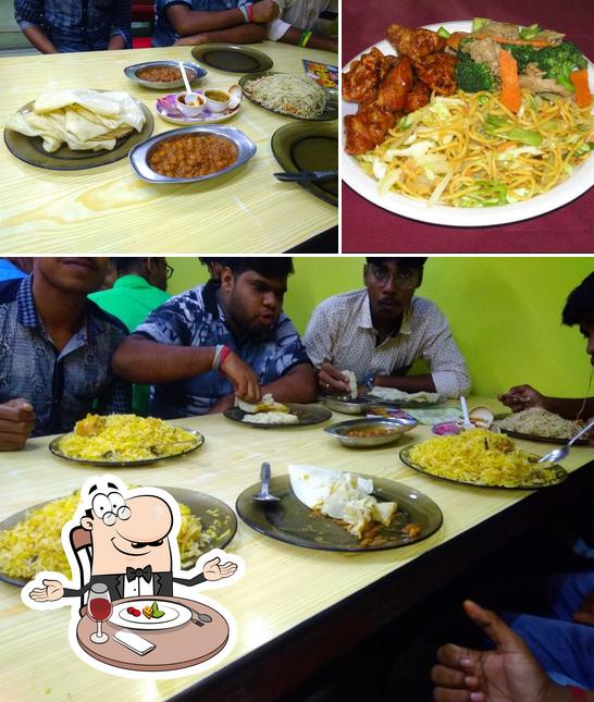 PURBASHA HOTEL & RESTAURANT is distinguished by dining table and food