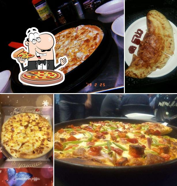Try out pizza at Refresh Eat & Drink