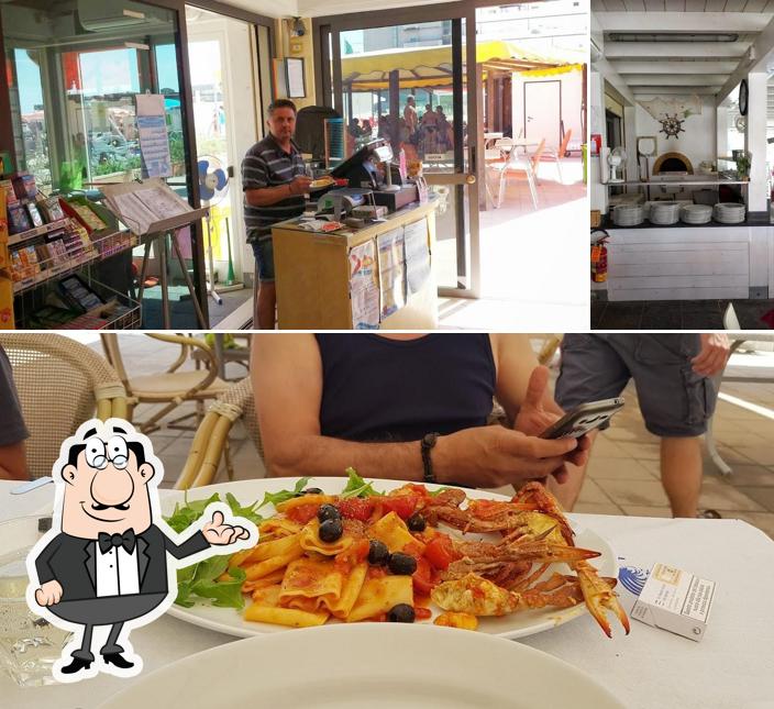 Siediti a un tavolo di Coco Beach