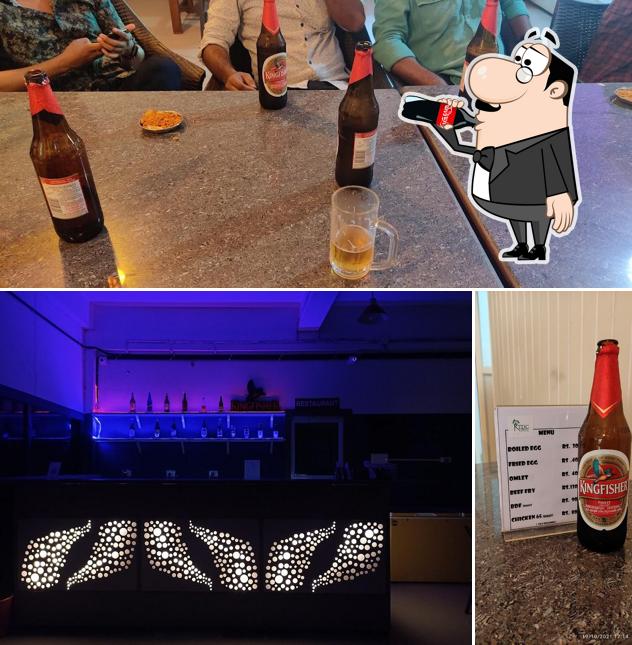 The photo of drink and bar counter at KTDC Beer Parlour & Restaurant