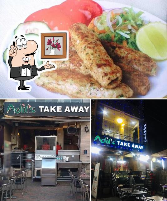 The image of interior and food at Adil's Take Away