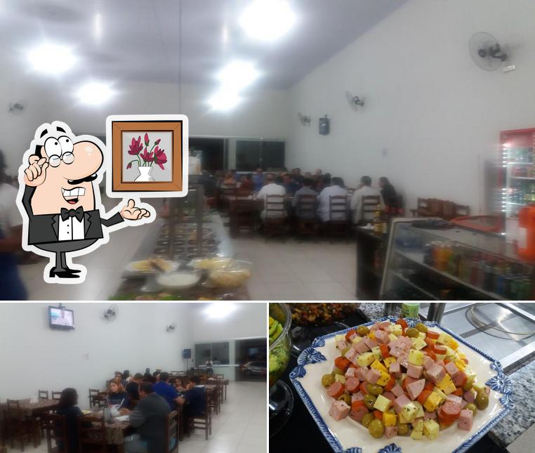 A imagem do Espeto e Restaurante do Marildo’s interior e comida