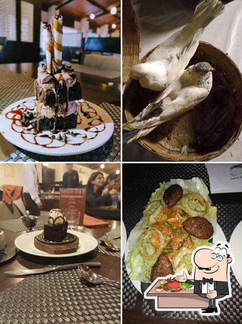 Get seafood at Rajwadu The Village Hotel