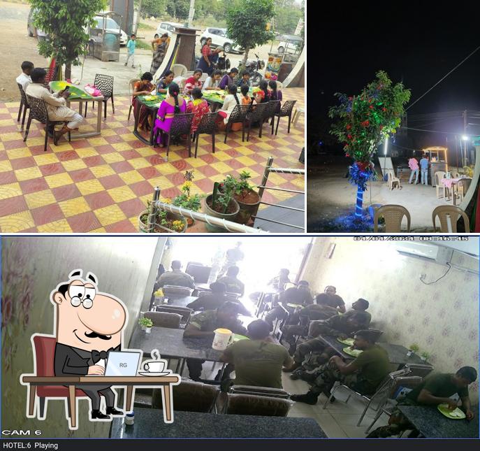 Take a seat at one of the tables at Sri Venkateswara Food Palace A/C