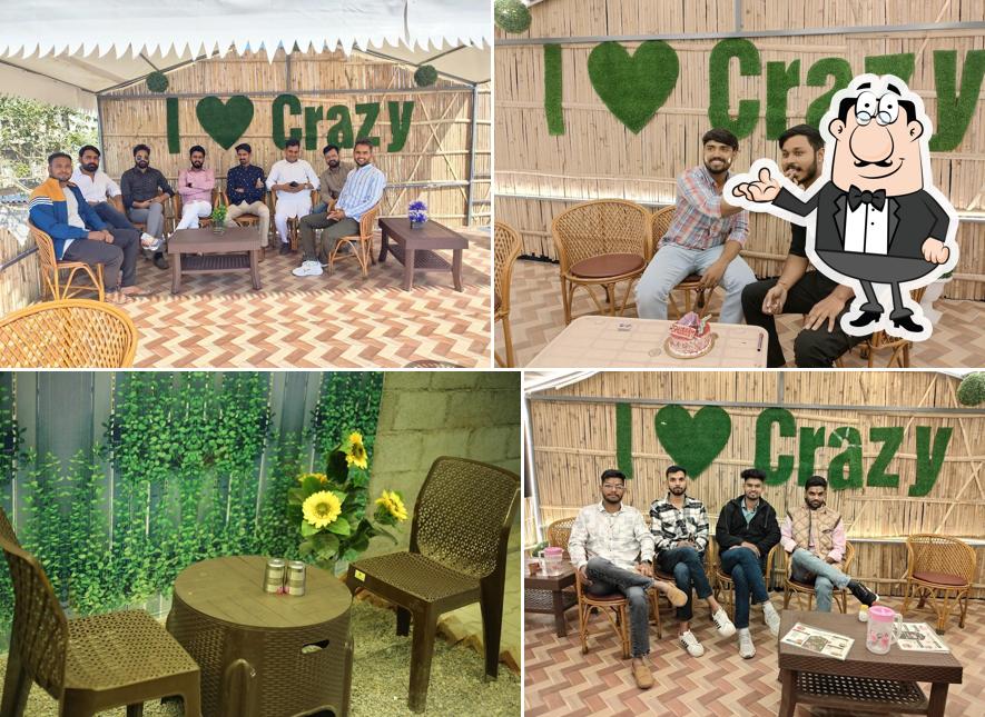 Take a seat at one of the tables at Crazy Foods Take a seat at one of the tables at Crazy Foods