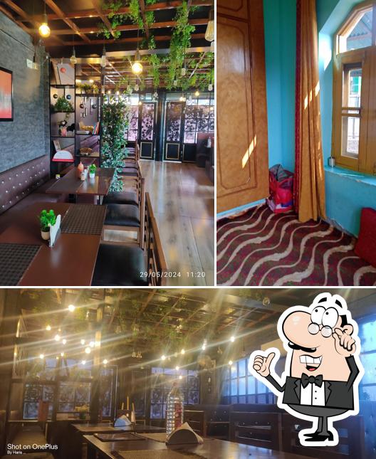 Take a seat at one of the tables at Black House Cafe