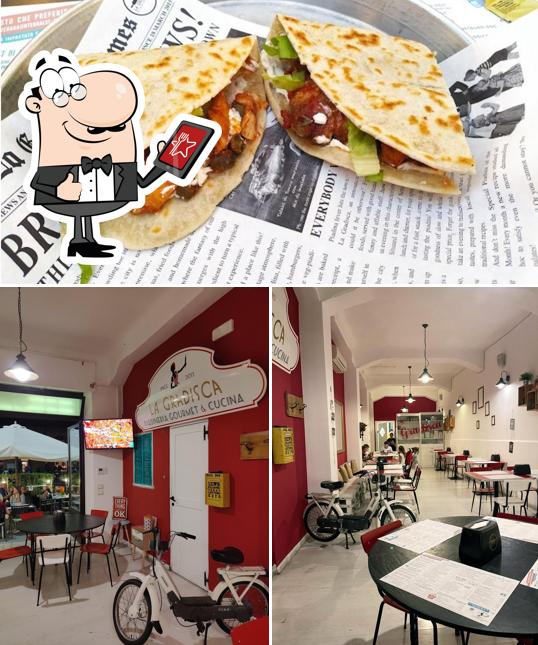 Dai un’occhiata alla immagine che presenta la esterno e cibo di Piadineria La Gradisca
